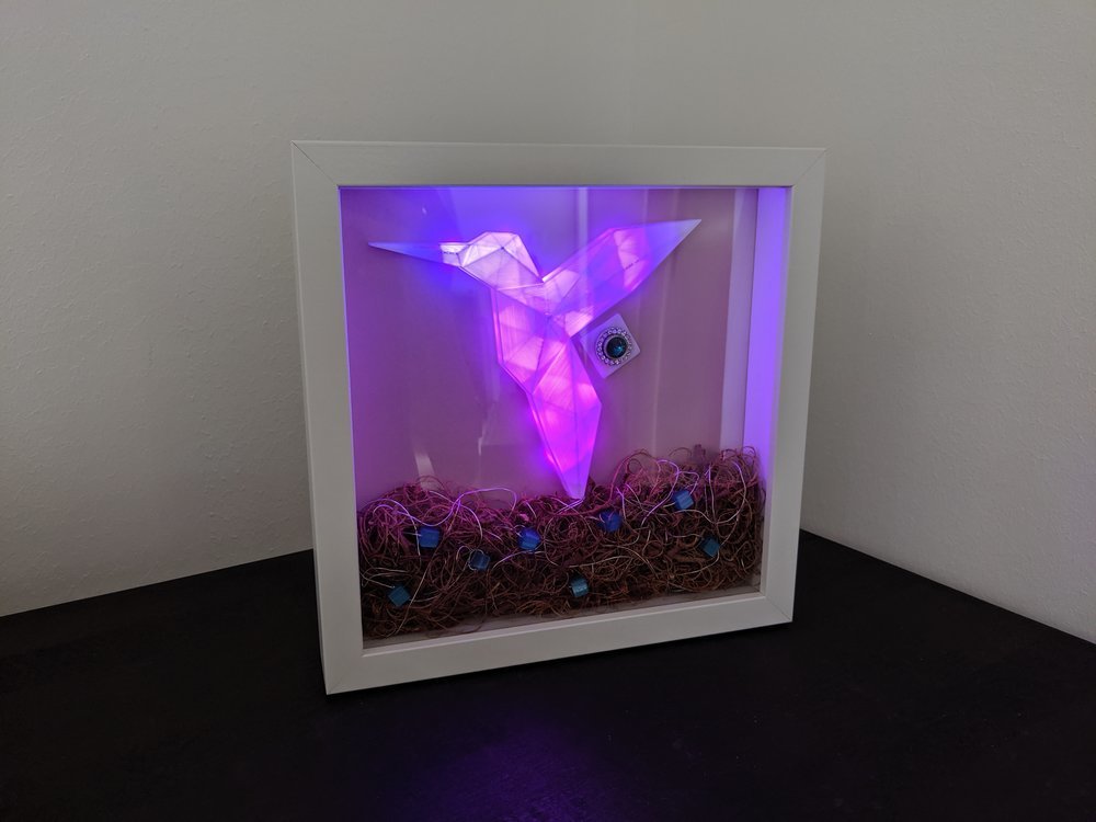 The LED hummingbird lighting in violet